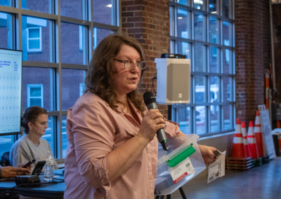CASA of Western Maryland BOD Vice President addresses crowd at the 2nd Annual Fall Bingo Blitz in October 2026.